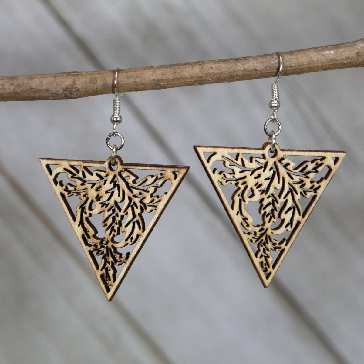 Hand-painted wooden Art Nouveau triangle dangle earrings featuring a nature-inspired filigree design with flowing lines and organic detail and hypoallergenic sterling silver hooks, lightweight jewelry for vintage style lovers and botanical art enthusiasts by Cate’s Concepts
