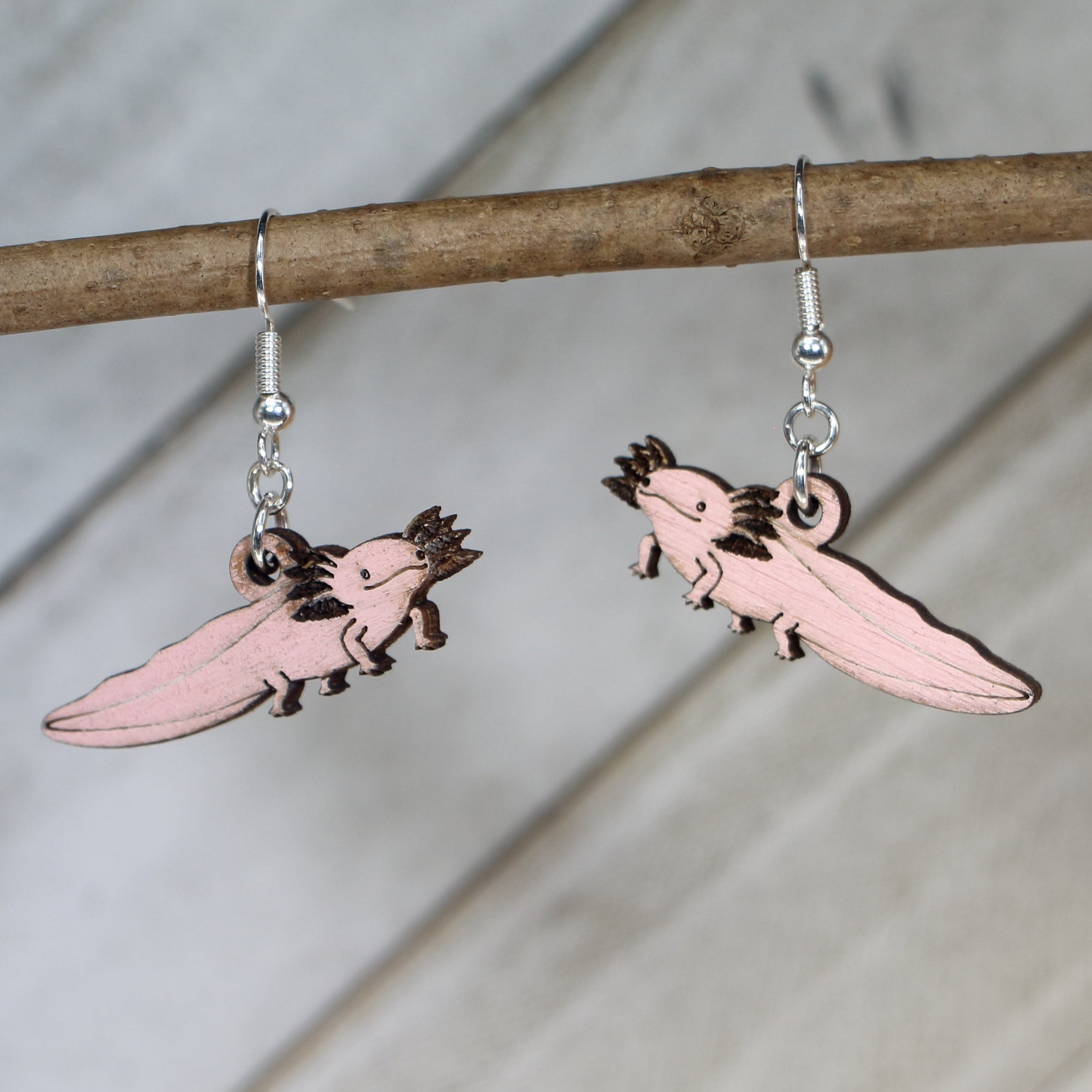 Hand-painted wooden axolotl dangle earrings with cute amphibian design and hypoallergenic sterling silver hooks, lightweight animal jewelry for aquatic lovers and quirky style by Cate’s Concepts
