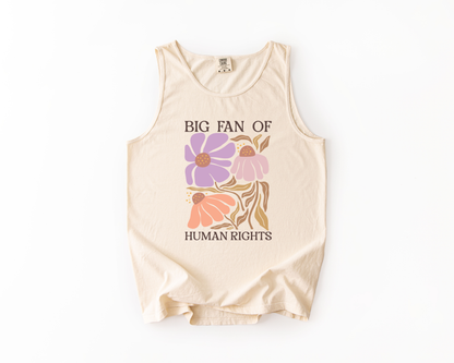 Beige tank top with floral design and text on a white background