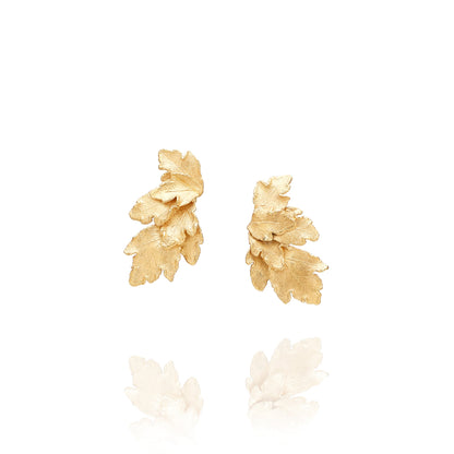 Vine leaf gold plated statement earrings, handmade jewelry, flat lay