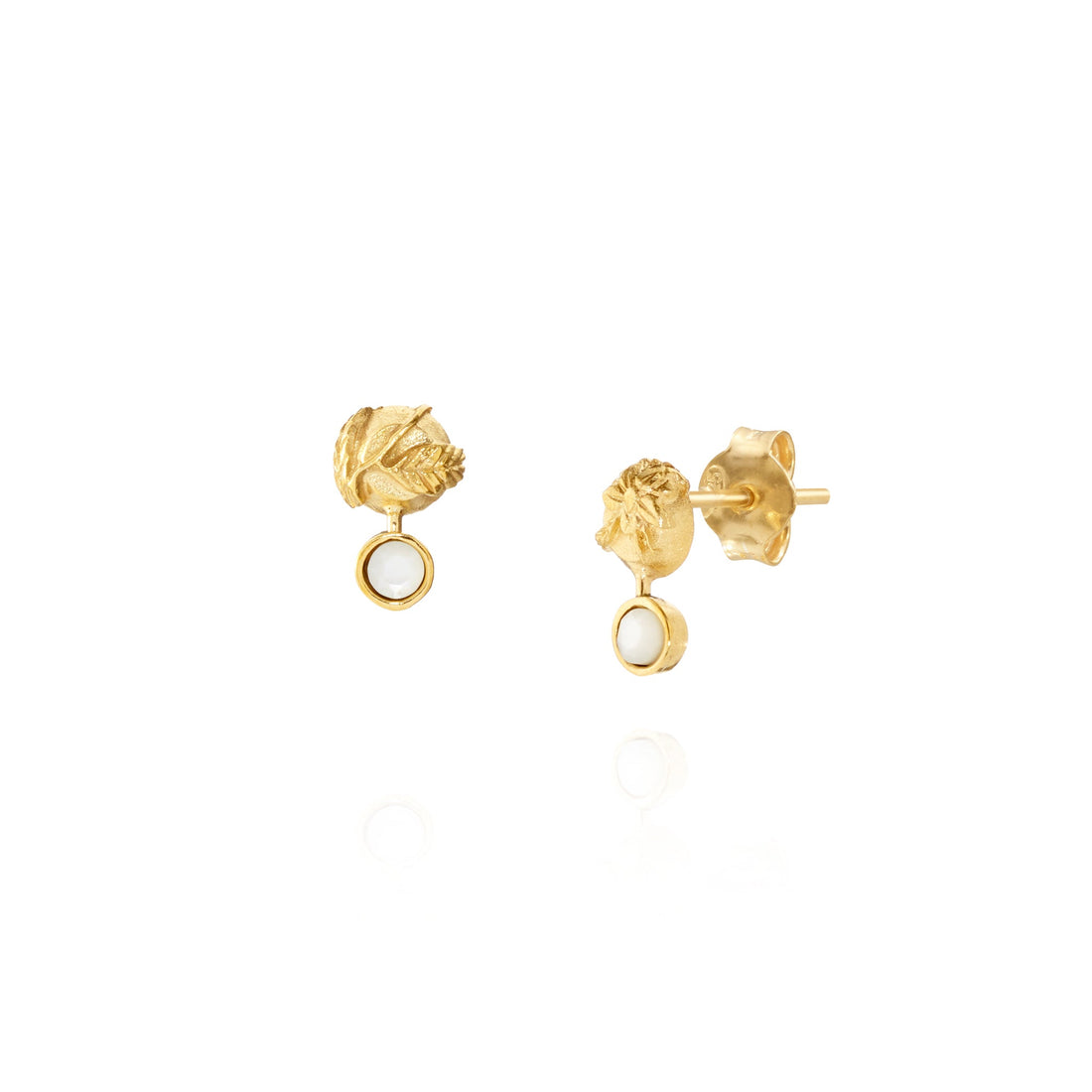 Ethically made gold flower and pearl earrings, flat lay