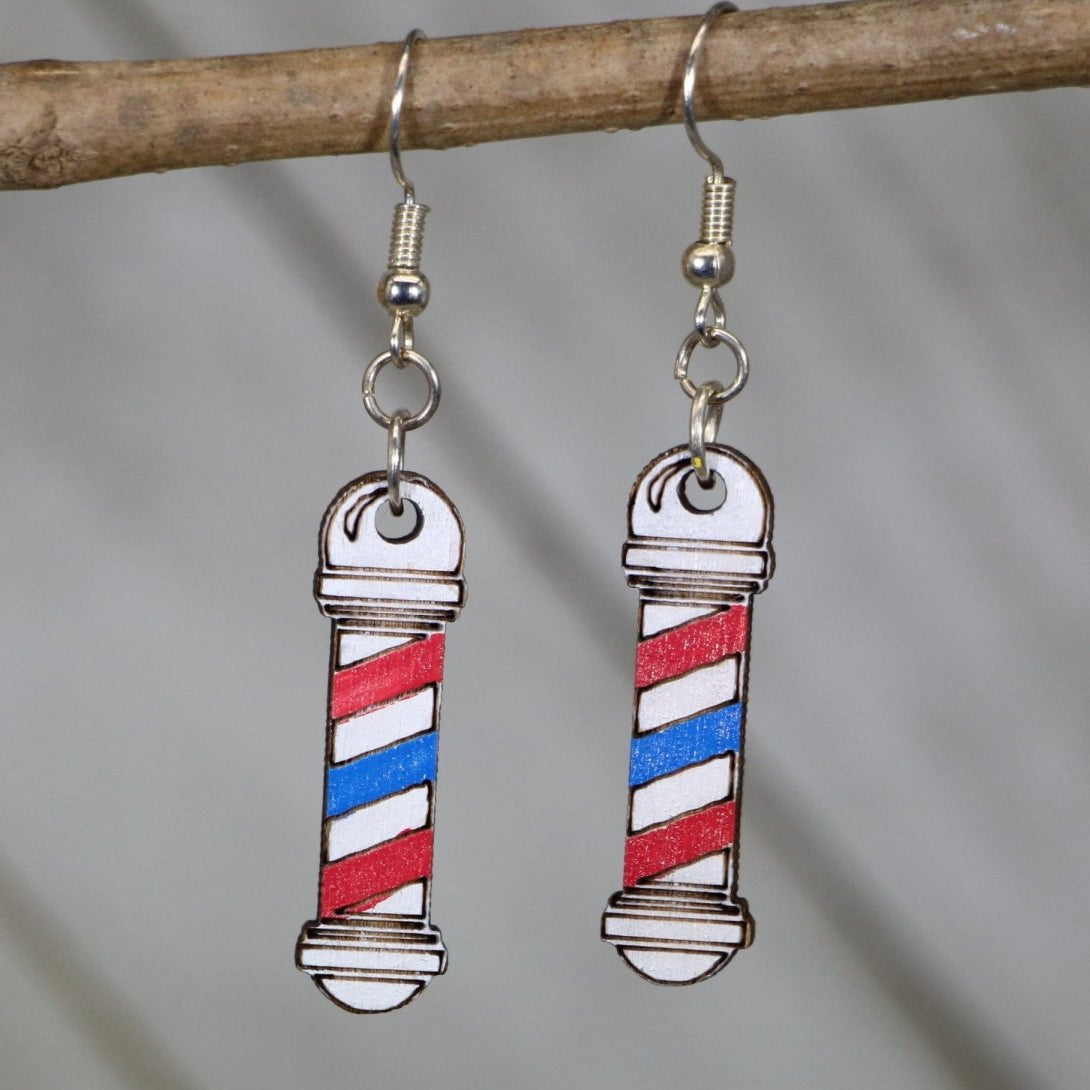 Hand-painted wooden barber pole dangle earrings with classic red white blue barber shop design and hypoallergenic sterling silver hooks, lightweight barber statement jewelry earrings for stylists and barbers