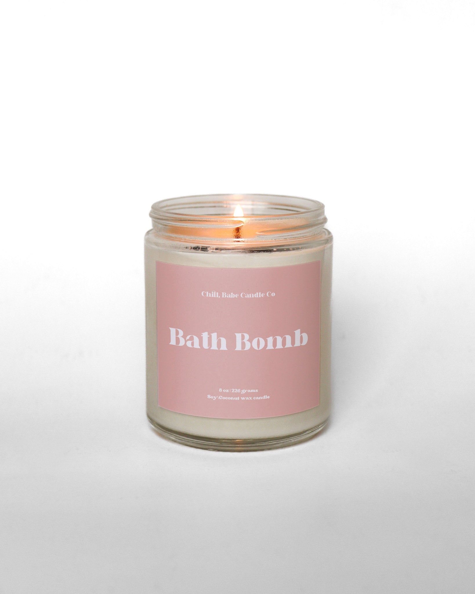 Bath Bomb candle in front of a white background