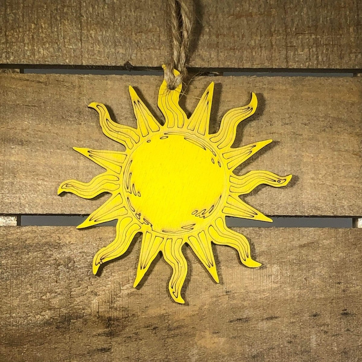 Hand-painted wooden bohemian sun Christmas ornament with celestial holiday design and lightweight festive decor, radiant sun tree decoration for boho winter and cosmic holiday style