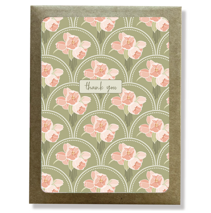 Kraft paper box with a cutout window showing a pink and green floral print thank you card