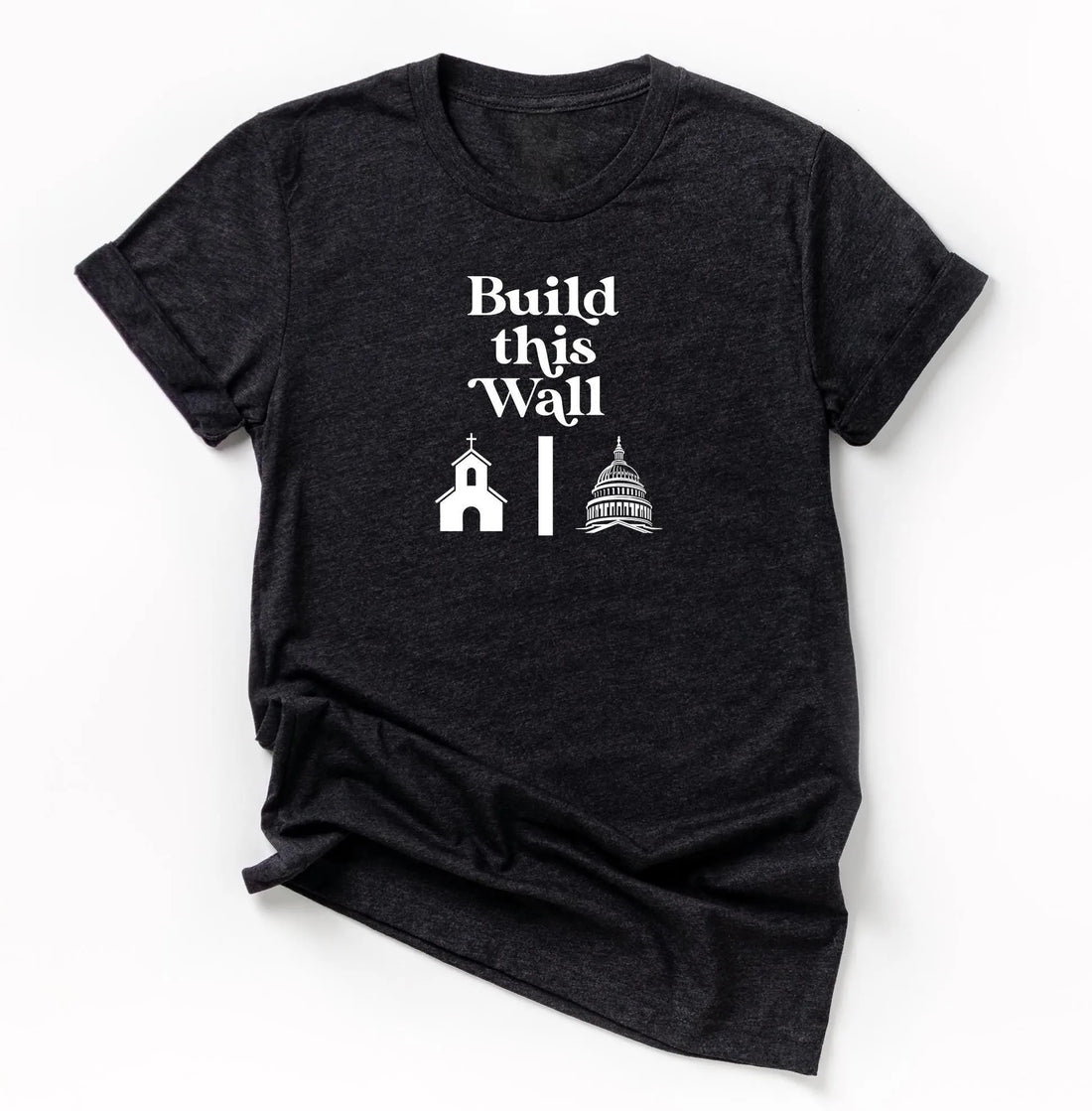 build this wall shirt.  black short sleeve shirt with white modern retro font and graphics of church being separated by wall and capital government building on other side.  snarky atheist shirt making fun of trump&amp;