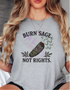 Woman wearing Burn Sage, Not Rights fall graphic tee featuring sage bundle artwork and a cozy autumn-inspired design.