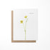 Greeting card featuring a watercolor illustration of a buttercup flower
