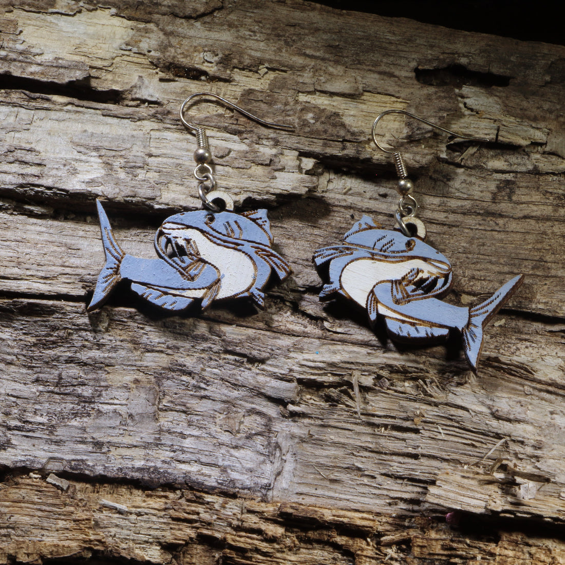 Hand-painted wooden catfish dangle earrings on hypoallergenic .925 sterling silver hooks. Lightweight fishing jewelry for anglers, fishermen, outdoor enthusiasts, and freshwater fish lovers.