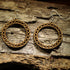 Hand-painted wooden Celtic knot hoop dangle earrings featuring an intricate interwoven Celtic knot design symbolizing eternity, unity, and heritage. Crafted from lightweight wood with hypoallergenic .925 sterling silver hooks, these artisan earrings are perfect for Celtic heritage, Irish and Scottish pride, Renaissance fairs, St. Patrick&