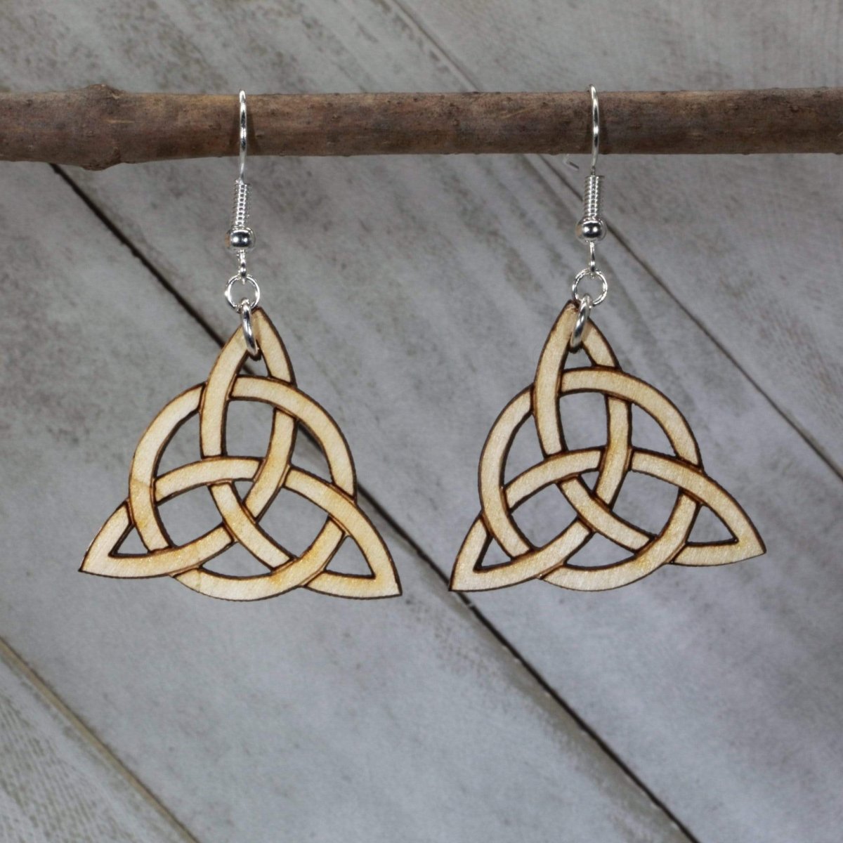 Hand-painted wooden Celtic trinity knot dangle earrings with traditional Irish symbol design and hypoallergenic sterling silver hooks, lightweight Celtic statement jewelry earrings for spiritual and heritage-inspired style