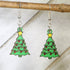 Hand-painted wooden Christmas tree dangle earrings with festive holiday design and hypoallergenic sterling silver hooks, lightweight tree statement jewelry earrings for winter and Christmas style