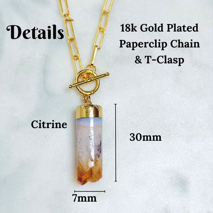 Citrine crystal pendant necklace with a 18k gold-plated paperclip chain and toggle clasp, shown with dimension labels indicating 30mm length and 7mm width on a light marble background.