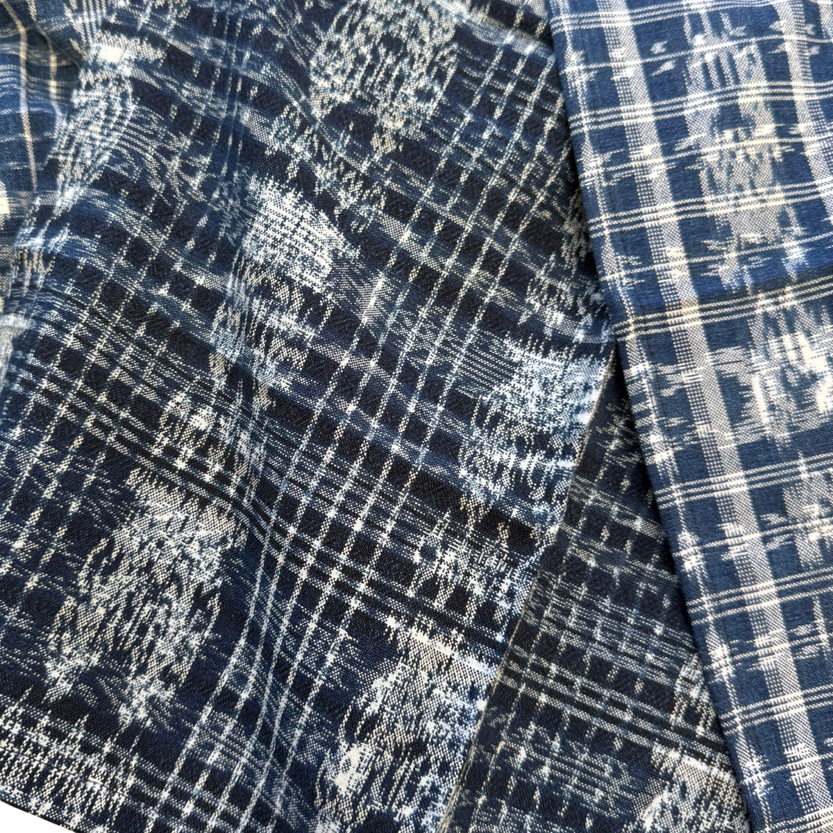 Close-up of blue (indigo) 
and white ikat fabric 