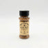 A small clear plastic bottle of Rainey Dog Ranch Duck Dust seasoning with a black cap and a tan label, centered on a light gray background.