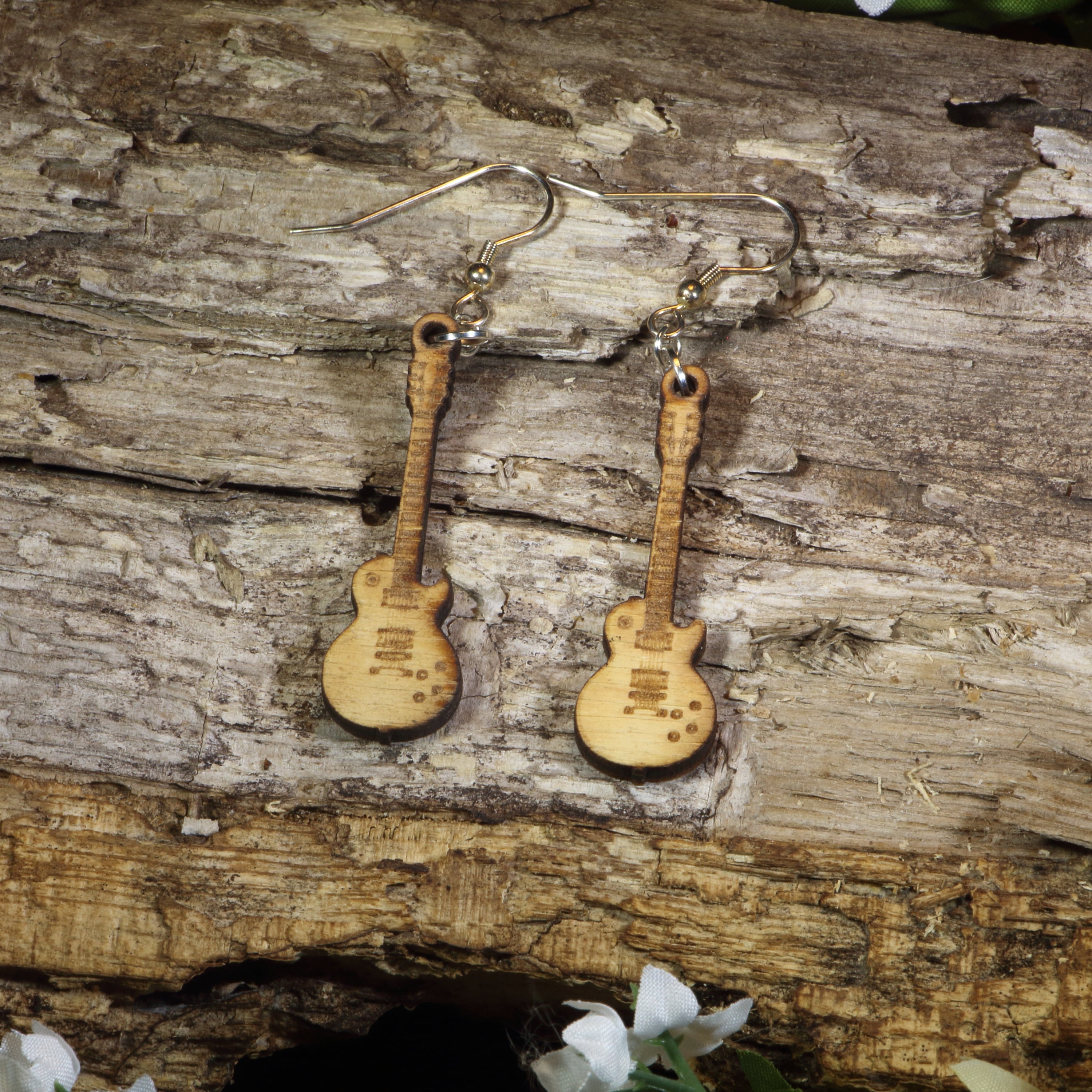 Hand-painted wooden electric guitar dangle earrings featuring detailed electric guitar silhouettes, hypoallergenic sterling silver hooks, and lightweight musician jewelry for guitar players, rock music fans, and band enthusiasts by Cate&
