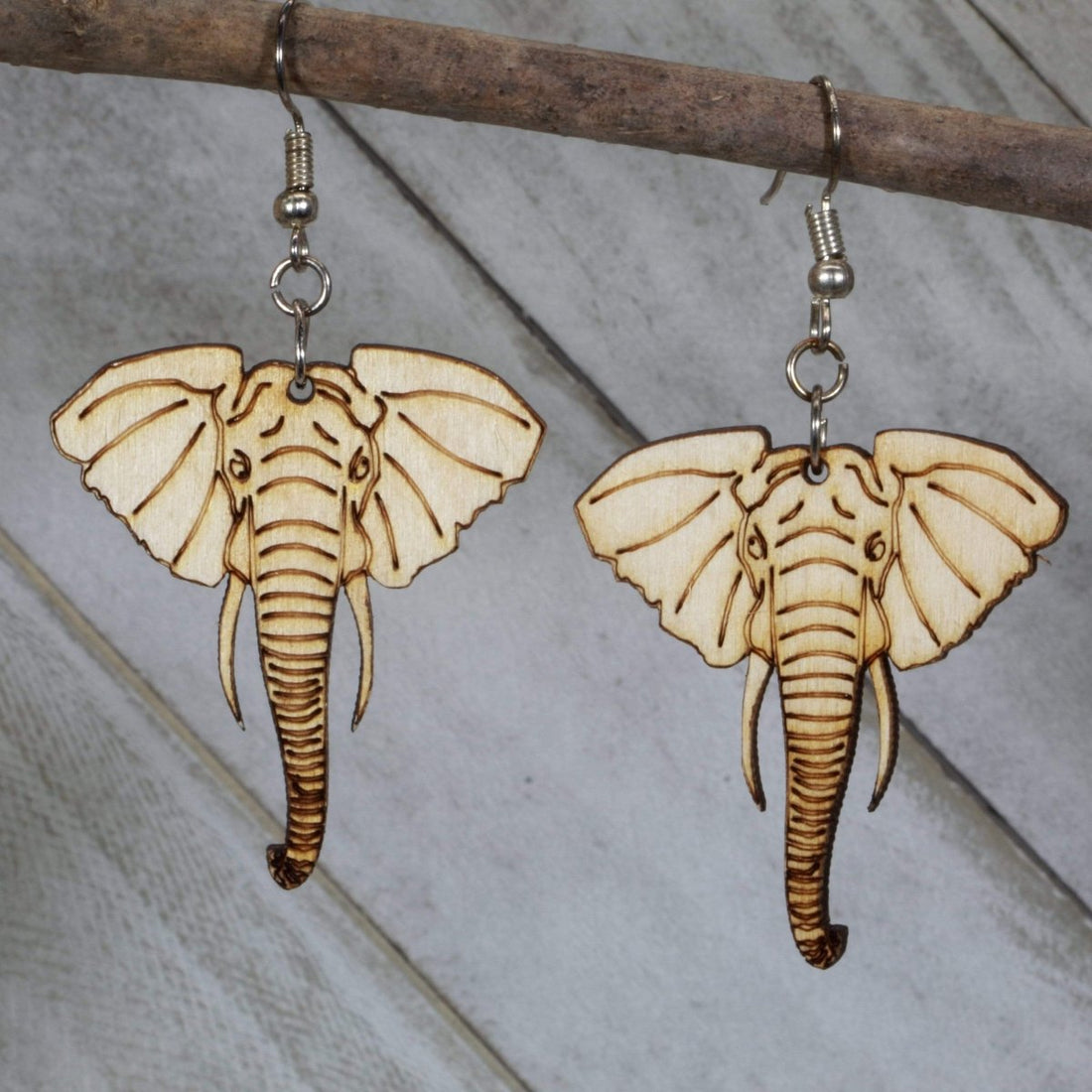 Hand-painted wooden elephant head dangle earrings with detailed wildlife design and hypoallergenic sterling silver hooks, lightweight elephant statement jewelry earrings for animal lovers and boho safari style