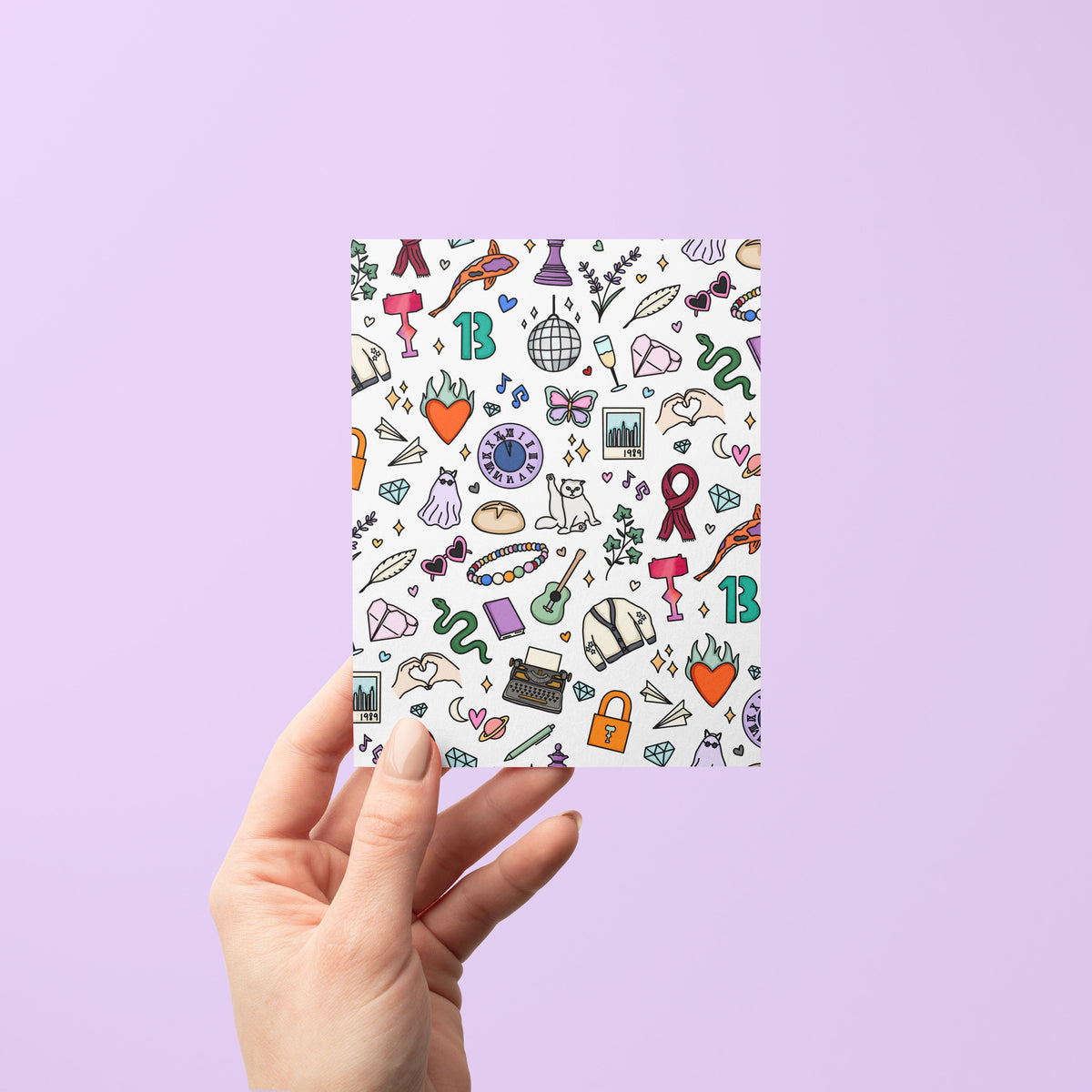 Eras Doodles Greeting Card flat lay — illustrated doodle pattern birthday and friendship card by indie artist MangoIllustrated