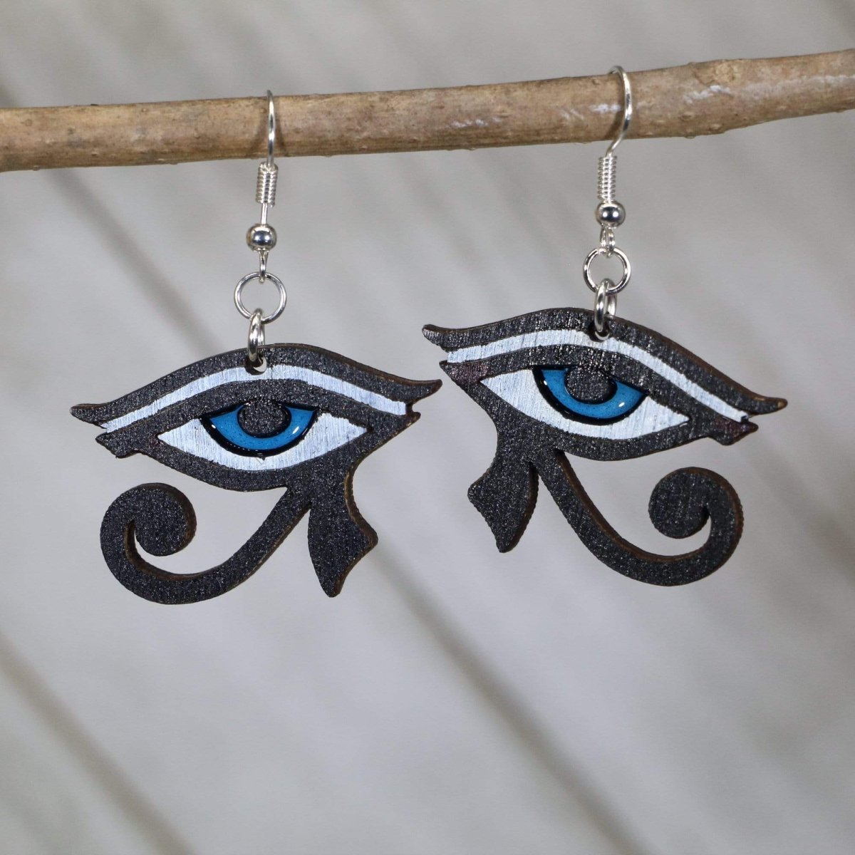Hand-painted wooden Eye of Horus dangle earrings with Egyptian symbol design and hypoallergenic sterling silver hooks, lightweight ancient Egypt statement jewelry earrings for history and spiritual style