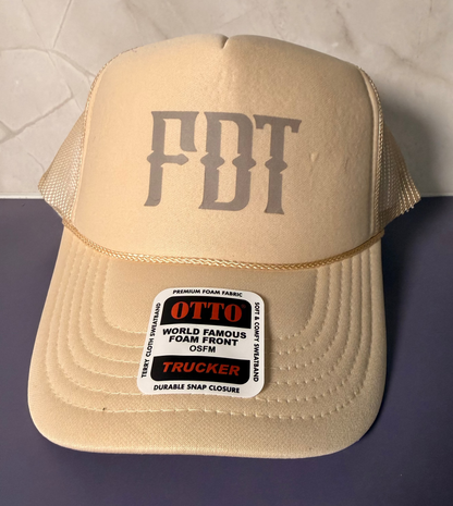 A beige trucker hat with &