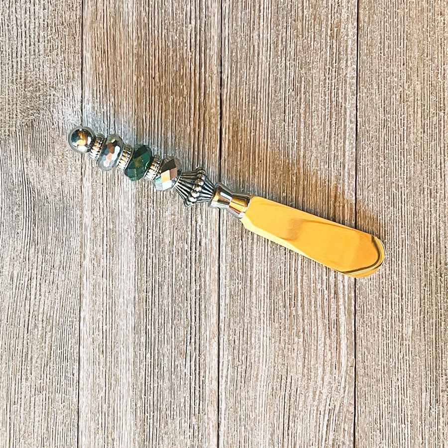 Close-up of the Dip Spreader Canapé Knife - Beaded Handle Charcuterie Knife showcasing its unique faceted and beaded handle.