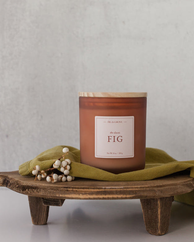 Fig candle in brown glass jar with white berries, evoking sweet figs and warm spices – Fig &amp; Grove