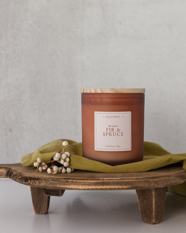 Fir &amp; Spruce candle in brown glass jar evoking fresh pine and winter woods – Fig &amp; Grove