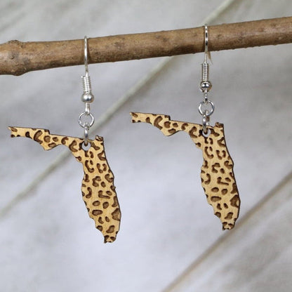 Hand-painted wooden Florida leopard print dangle earrings with bold Sunshine State design and hypoallergenic sterling silver hooks, lightweight tropical statement jewelry for Florida lovers and wild style fans
