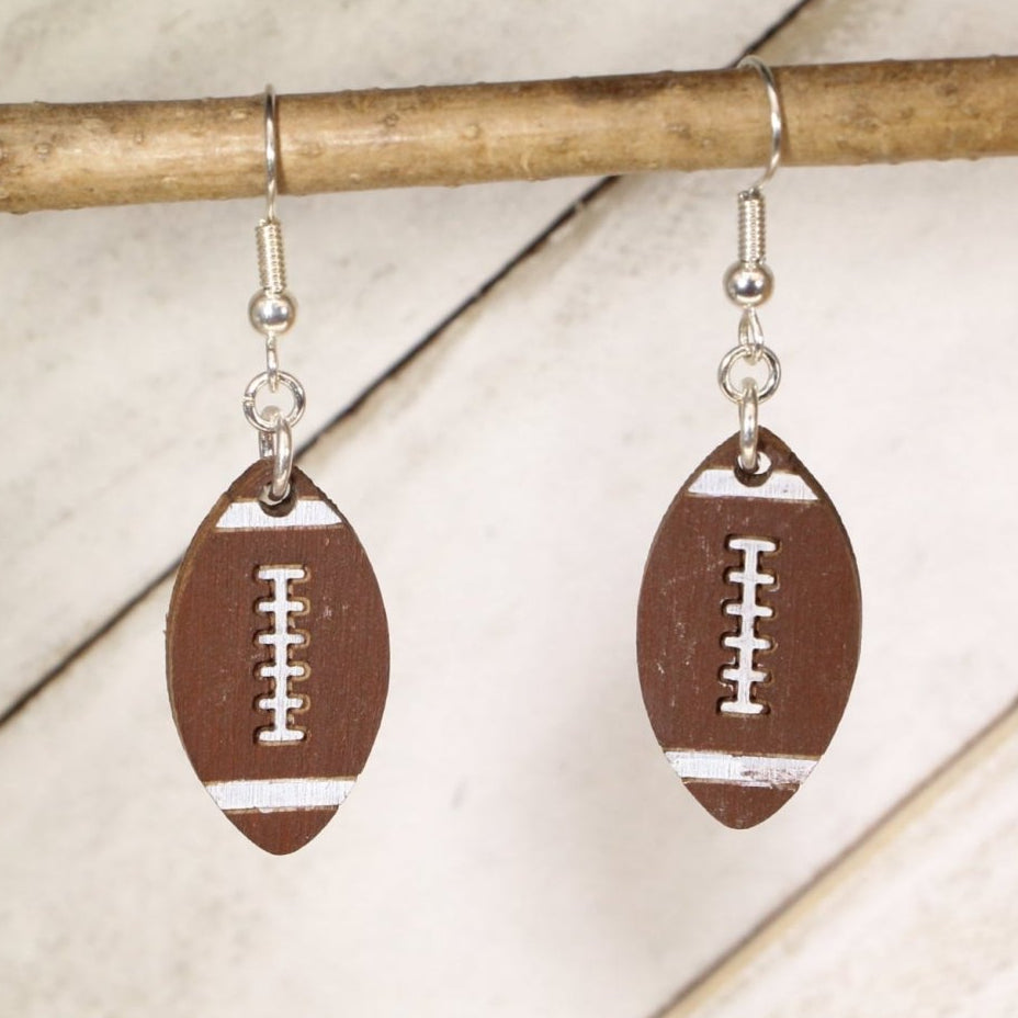 Hand-painted wooden football dangle earrings with classic pigskin design and hypoallergenic sterling silver hooks, lightweight football statement jewelry earrings for players, fans, and football moms