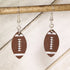 Hand-painted wooden football dangle earrings with classic pigskin design and hypoallergenic sterling silver hooks, lightweight football statement jewelry earrings for players, fans, and football moms