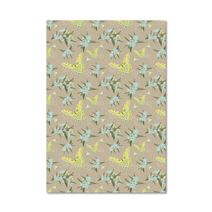 Gift wrap sheet featuring a repeating pattern of light blue flowers, green leaves, and yellow butterflies on a warm beige background, shown against a plain white backdrop.