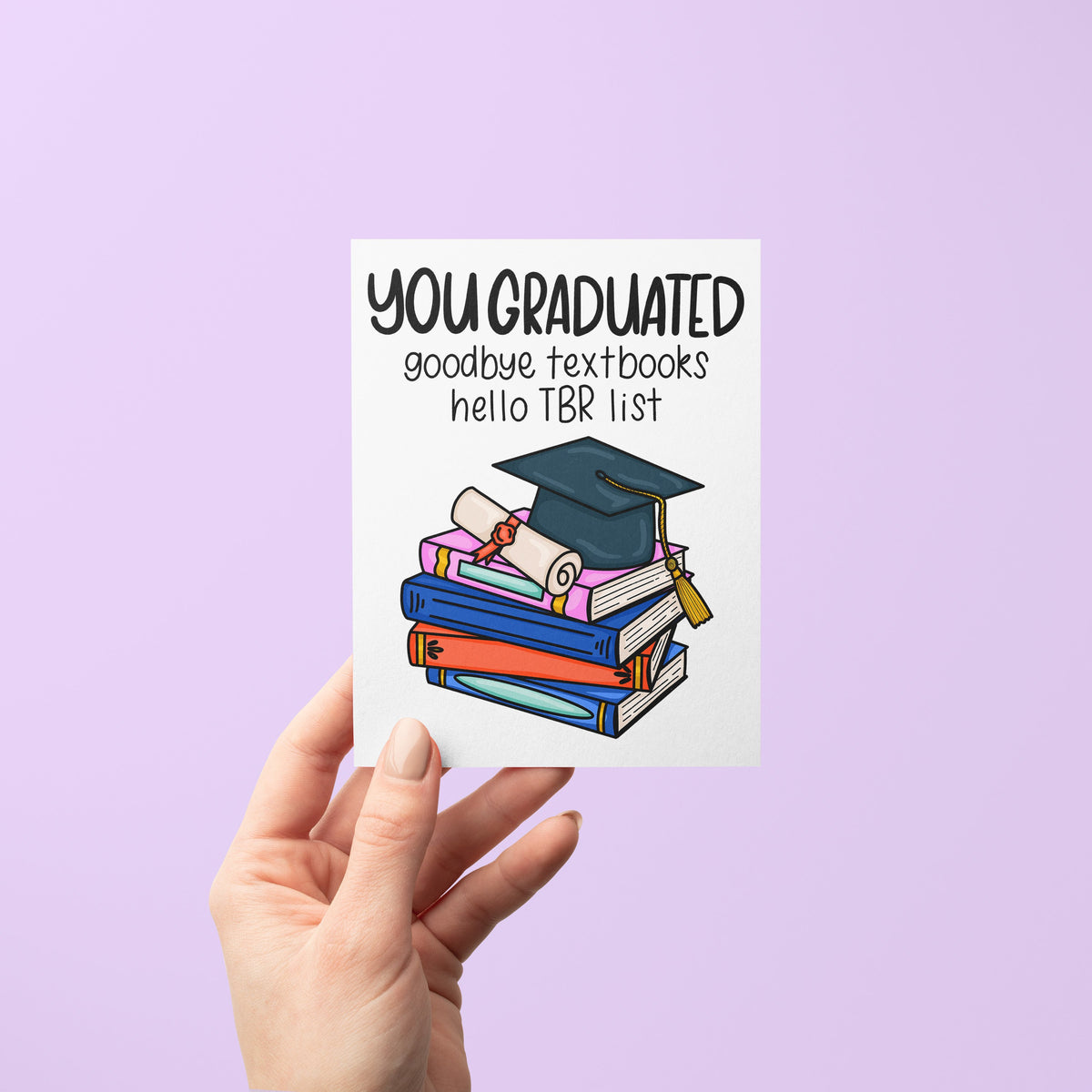 Bookish Graduation Card for Book Lovers detail — hand lettered book stack illustration on a graduation card by indie artist MangoIllustrated
