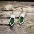 Handcrafted resin green Christmas light wooden dangle earrings featuring colorful holiday light bulbs with glossy resin-filled centers. Lightweight laser-cut wooden earrings with hypoallergenic .925 sterling silver hooks, perfect for Christmas celebrations, holiday parties, festive fashion, Christmas light lovers, and seasonal handmade jewelry.