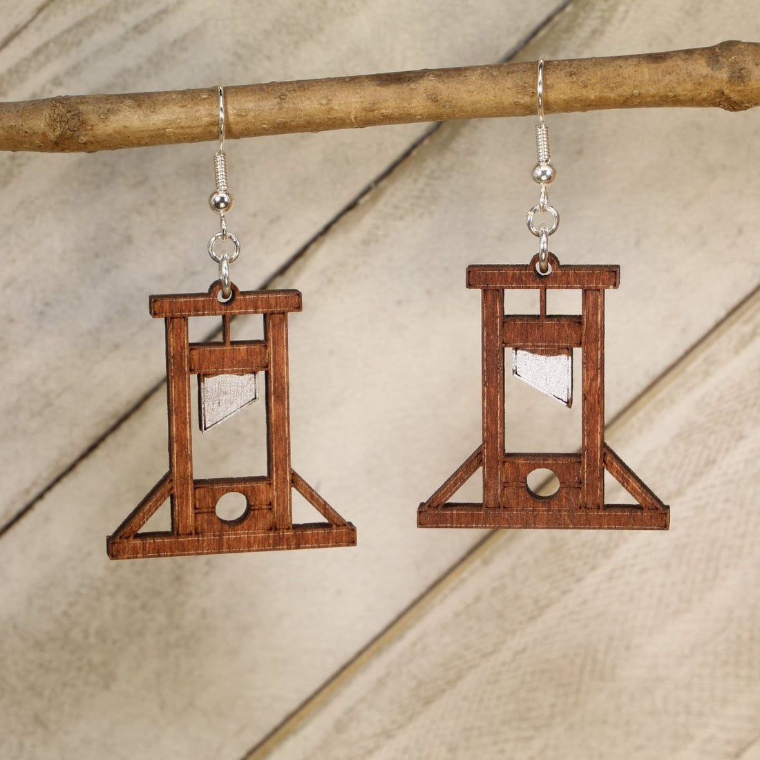 Hand-painted wooden guillotine dangle earrings with gothic historic design and hypoallergenic sterling silver hooks, quirky dark humor statement jewelry for spooky style lovers