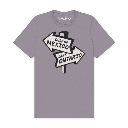 A light purple-gray crewneck t-shirt featuring a graphic of a road sign pointing to &