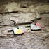 Hand-painted Floral Oklahoma wooden dangle earrings featuring the Oklahoma state silhouette accented with a colorful floral design. Lightweight and comfortable, these state pride earrings are perfect for Oklahoma natives, travelers, teachers, and anyone who loves showing off their Sooner State pride.