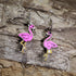 Hand-painted pink flamingo wooden dangle earrings on hypoallergenic .925 sterling silver hooks. Lightweight tropical bird jewelry for flamingo lovers, beach enthusiasts, coastal décor fans, summer fashion, and bird lovers.