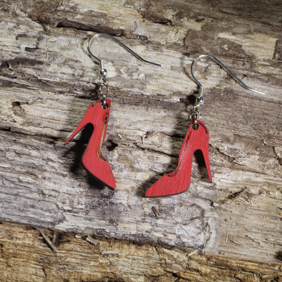 Hand-painted red high heel wooden dangle earrings on hypoallergenic .925 sterling silver hooks. Lightweight fashion jewelry for shoe lovers, fashion enthusiasts, boutique style, and anyone who loves bold statement accessories.