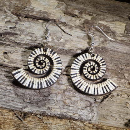 Hand-painted spiral piano keyboard wooden dangle earrings on hypoallergenic .925 sterling silver hooks. Lightweight music jewelry featuring a swirling piano keyboard design, perfect for pianists, piano teachers, musicians, music students, and keyboard lovers.