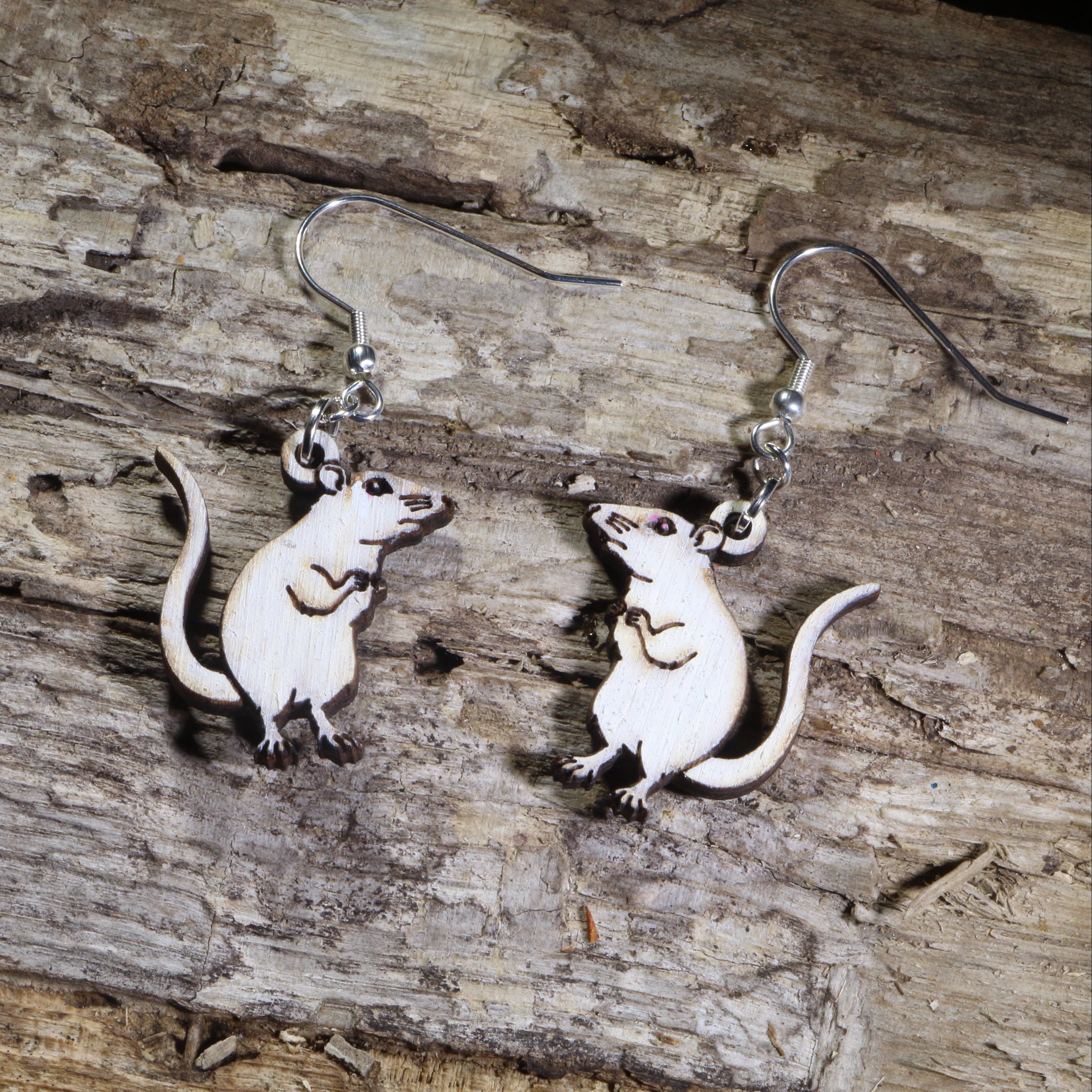 Hand-painted white rat wooden dangle earrings on hypoallergenic .925 sterling silver hooks. Lightweight pet rat jewelry for rat owners, fancy rat enthusiasts, small animal lovers, and rodent fans.