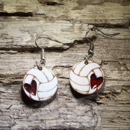 Hand-painted white volleyball wooden dangle earrings with red resin heart accents, lightweight sports jewelry for volleyball players and fans