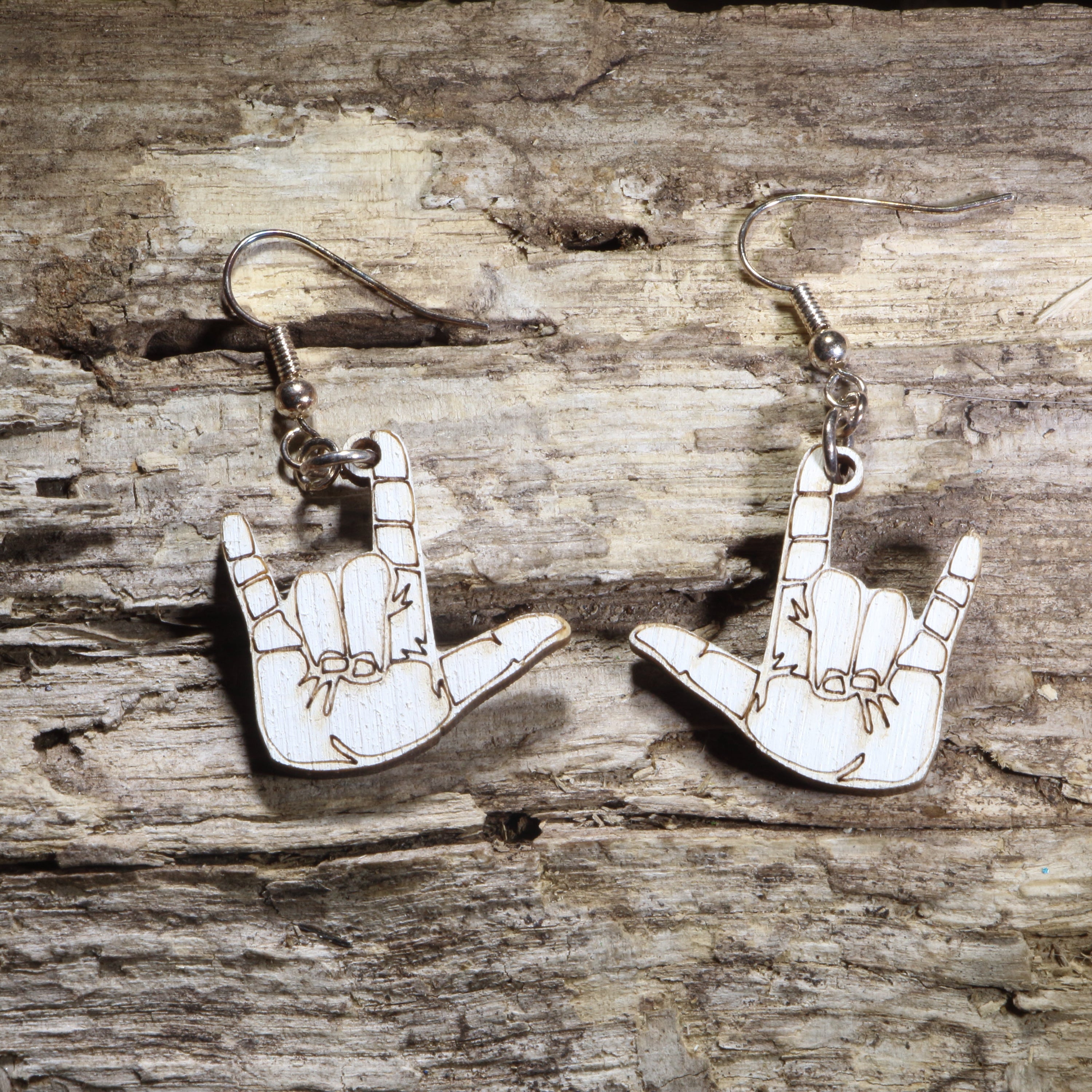 Hand-painted wooden American Sign Language "I Love You" hand sign dangle earrings on hypoallergenic .925 sterling silver hooks. Lightweight ASL-inspired jewelry for Deaf community members, sign language interpreters, teachers, students, and advocates.