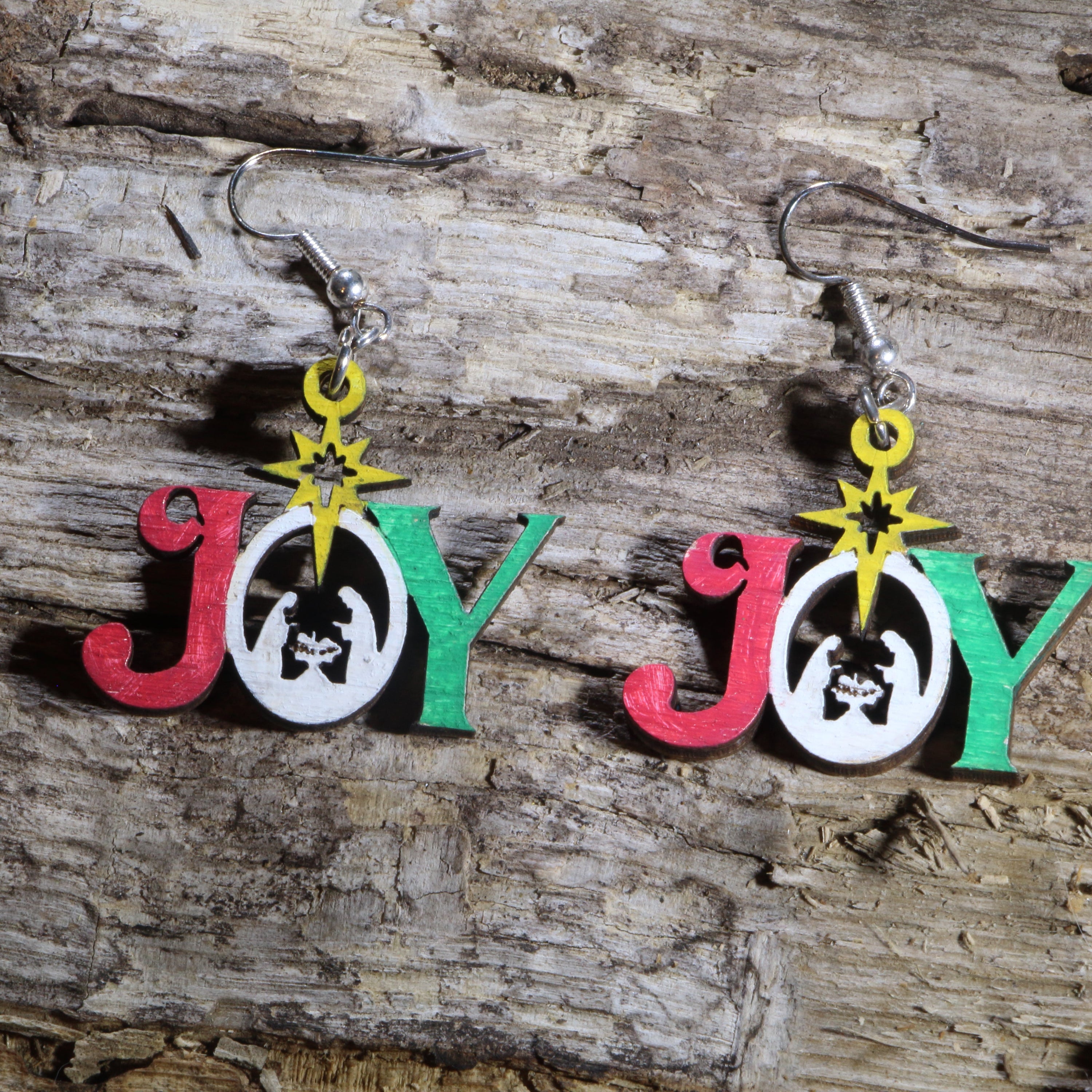 Hand-painted wooden Christmas Joy dangle earrings featuring a beautiful Nativity-inspired holiday design. Lightweight Christmas earrings with hypoallergenic .925 sterling silver hooks, perfect for celebrating the true meaning of Christmas, church events, and seasonal gifts.featuring a beautiful Nativity-inspired holiday design. Lightweight Christmas earrings with hypoallergenic .925 sterling silver hooks, perfect for celebrating the true meaning of Christmas, church events, and seasonal gifts.