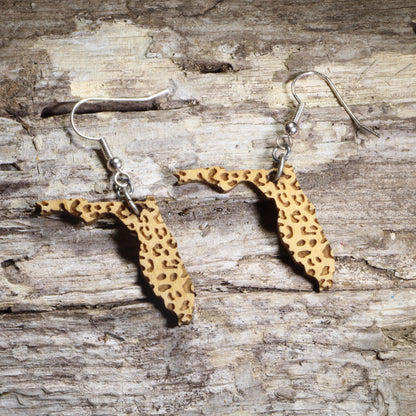 Hand-painted wooden Florida dangle earrings featuring a tan leopard print pattern on hypoallergenic .925 sterling silver hooks. Lightweight Florida-themed jewelry for animal print lovers, travel souvenirs, hometown pride, and unique regional accessories.