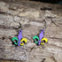 Hand-painted wooden Mardi Gras fleur-de-lis dangle earrings featuring the iconic fleur-de-lis in traditional purple, green, and gold colors on hypoallergenic .925 sterling silver hooks. Lightweight New Orleans jewelry for Mardi Gras celebrations, Louisiana culture, festival wear, and fleur-de-lis lovers.