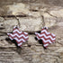 Hand-painted wooden Texas dangle earrings featuring a maroon and white chevron pattern on hypoallergenic .925 sterling silver hooks. Lightweight Texas-themed jewelry for game day, hometown pride, travel souvenirs, and unique regional accessories.
