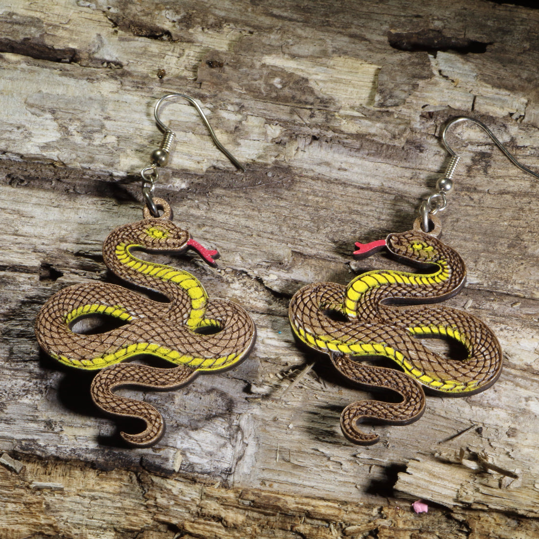 Hand-painted wooden copper snake dangle earrings featuring a coiled copper serpent design on hypoallergenic .925 sterling silver hooks. Lightweight reptile nature jewelry for snake lovers, herpetologists, wildlife enthusiasts, and anyone who appreciates unique animal-inspired accessories.