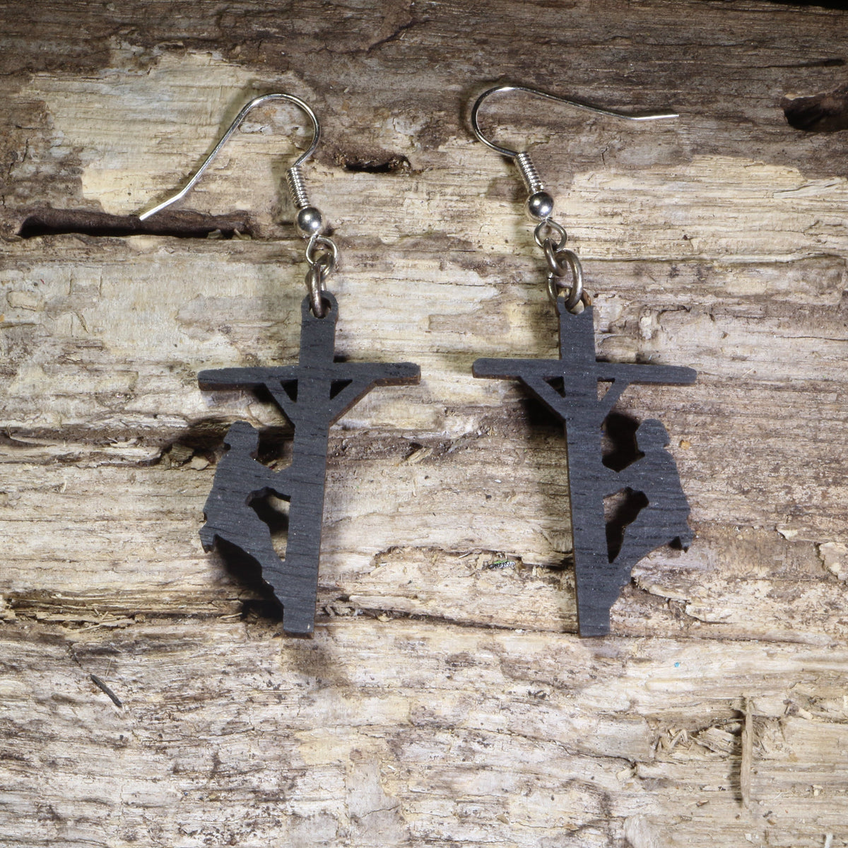 Hand-painted wooden lineman dangle earrings featuring a utility worker climbing a power pole silhouette on lightweight wood with hypoallergenic .925 sterling silver hooks. Perfect for linemen, electrical utility workers, power company employees, electricians, apprentices, and meaningful trade profession jewelry.
