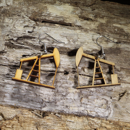 Hand-painted wooden oil pumpjack dangle earrings on hypoallergenic .925 sterling silver hooks. Lightweight oilfield jewelry for petroleum engineers, roughnecks, oil and gas workers, energy professionals, and industry enthusiasts.