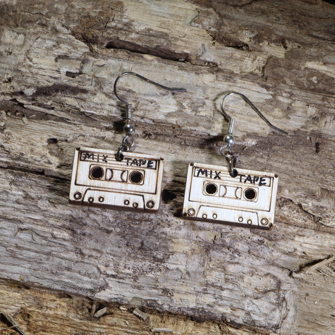 Hand-painted wooden vintage cassette tape dangle earrings featuring a classic mix tape design on hypoallergenic .925 sterling silver hooks. Lightweight retro music jewelry for 80s and 90s nostalgia lovers, music fans, cassette collectors, DJs, and vintage accessory enthusiasts.